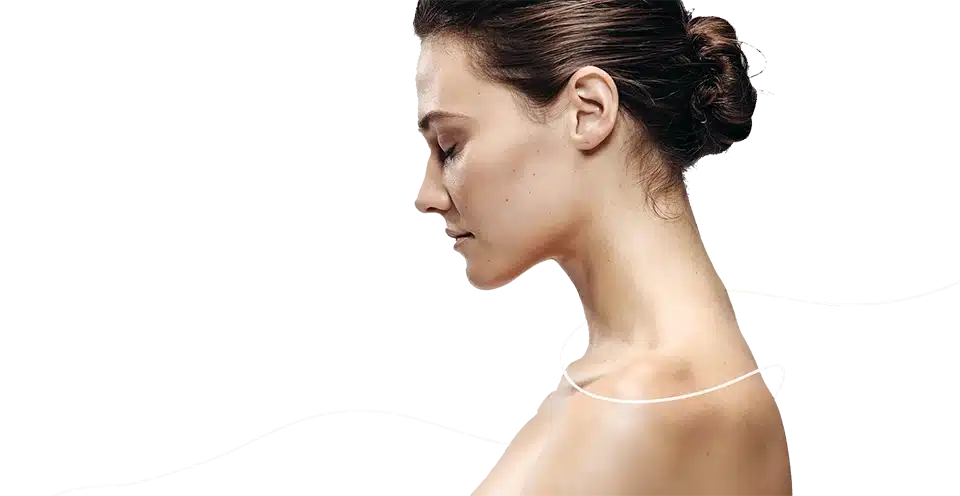 Profile of woman with bun hairstyle, looking down