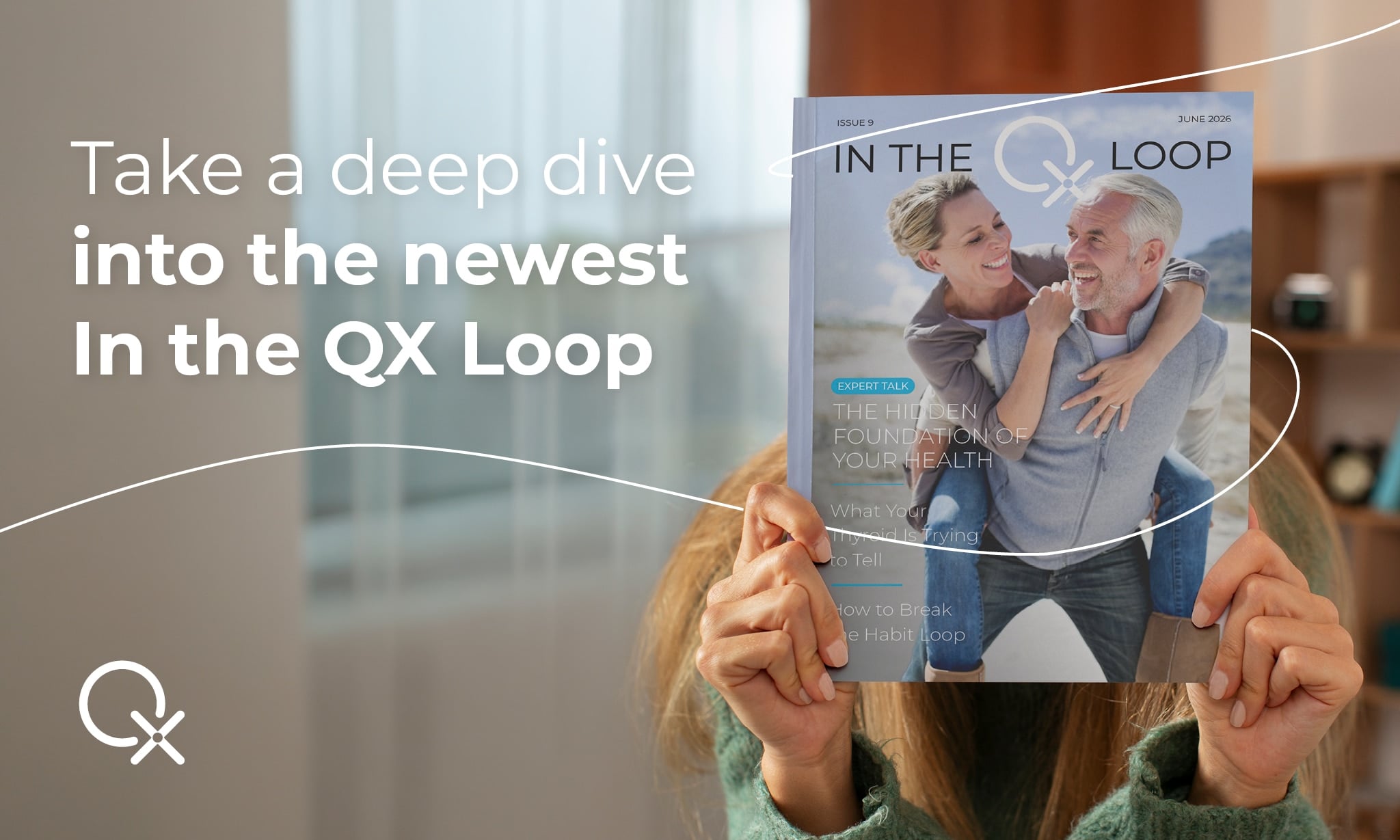 Person holding In the QX Loop magazine cover