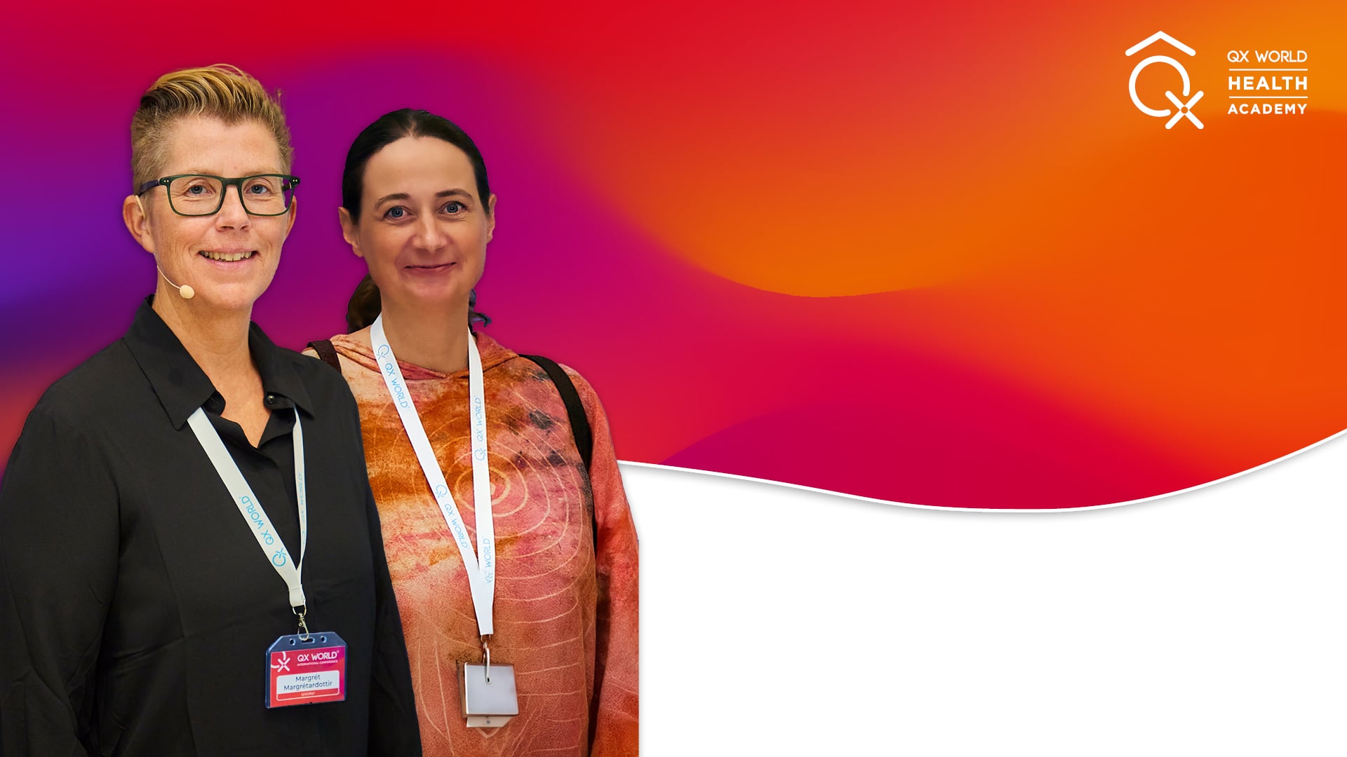 Two women with event badges at health conference