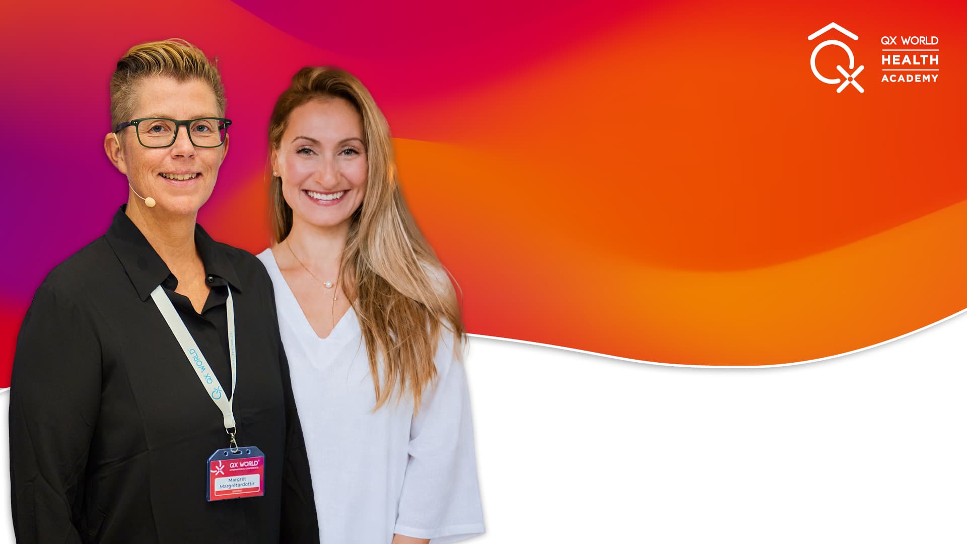Two women smiling at health academy event